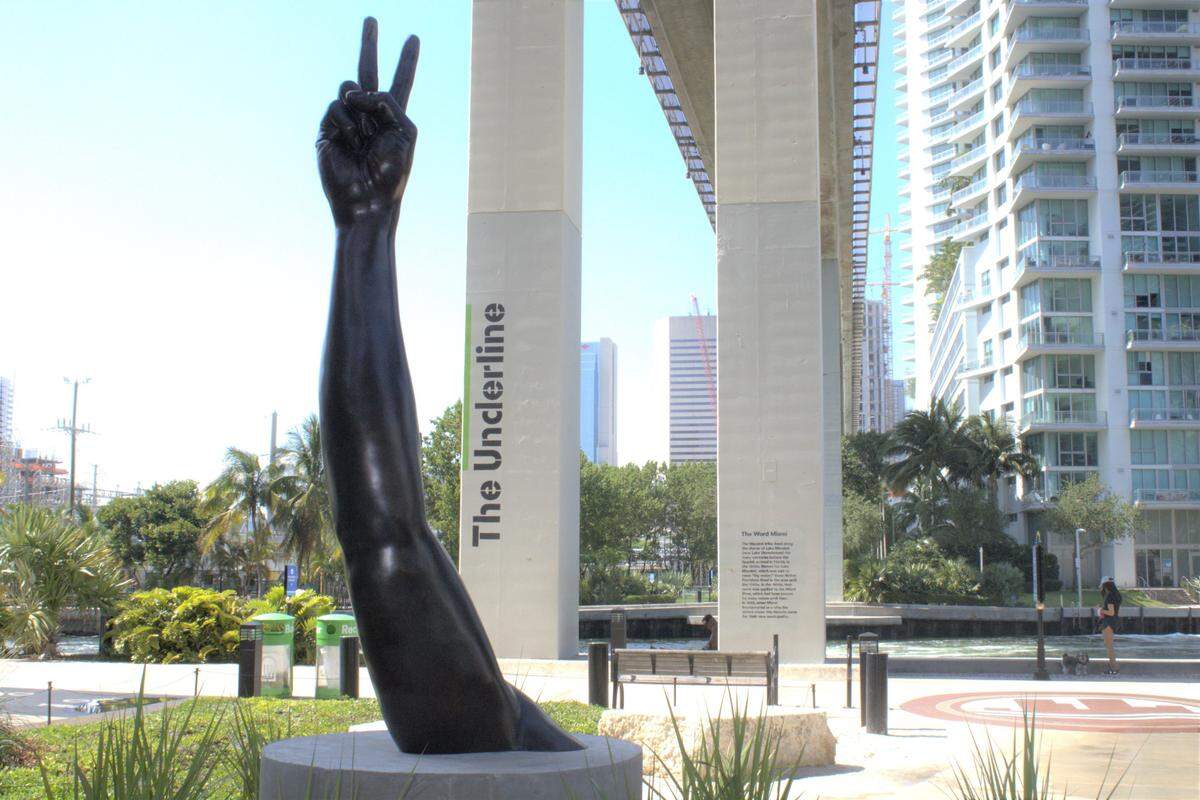 “Duality,” a sculpture by renowned artist Hank Willis Thomas, is part of the art collection that’s part of the Underline, a 10-mile linear park that beneath the Metrorail. Underline managers say they want to bring art to columns under the Metrorail as well.