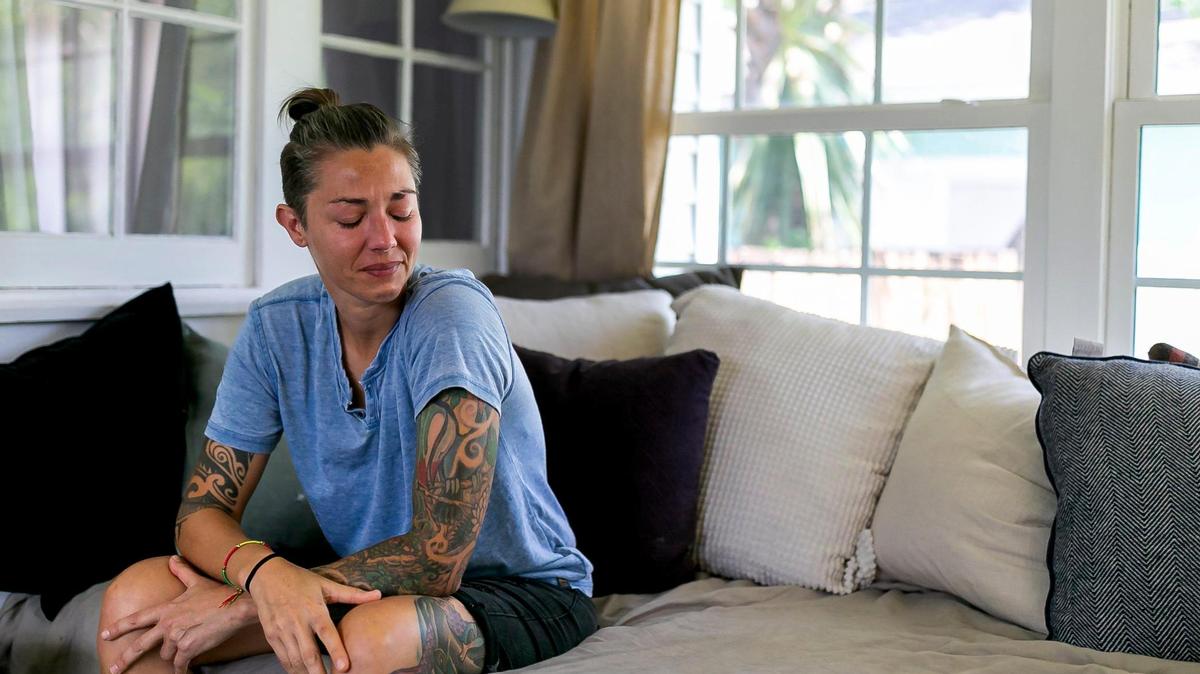 Broward Sheriff’s Office Battalion Chief Nichole Notte, 41, is photographed at her home on Tuesday, June 21, 2022 in Fort Lauderdale, Fla. Notte, who was a first responder during the Champlain Towers South condo collapse in Surfside, has been dealing with post traumatic stress disorder and anxiety.