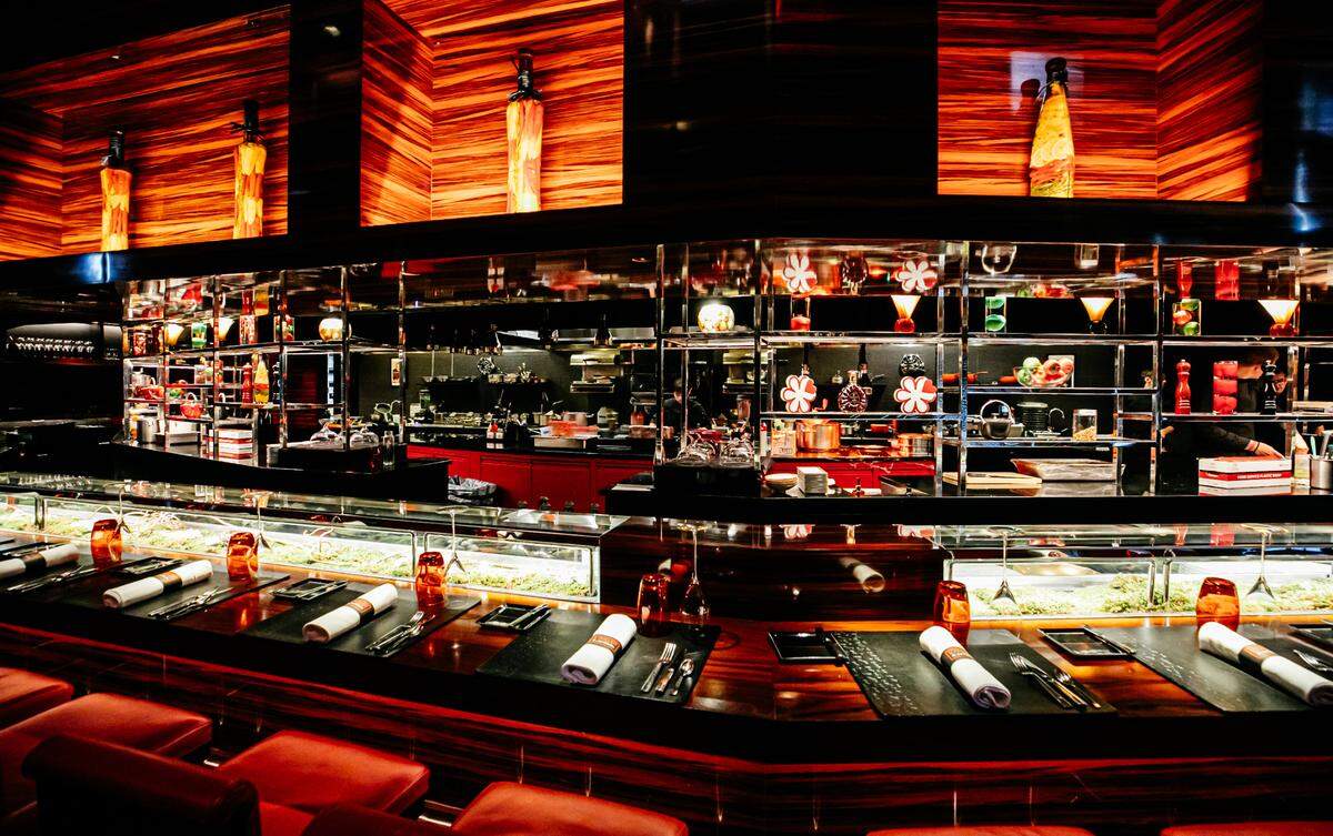 L’Atelier de Joël Robuchon in Miami displays its Michelin stars behind its famous counter. It earned two stars for the first time in 2022 and again in 2023.
