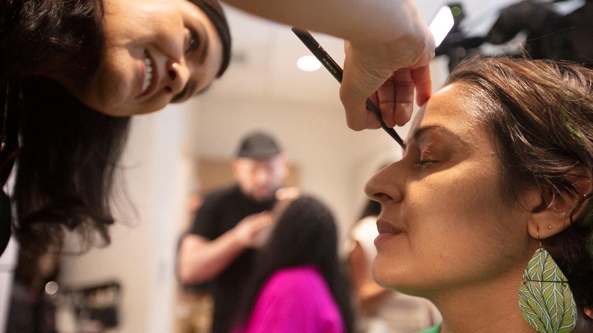 (L) Jessica Dorregaray, Estés Lauder Education Manager , does (R) Myra Camino’s make up during the grand opening of Memorial Cancer Institute’s Center for Mind, Body & Spirit that offers a variety of spa services to cancer patients including personalized wig fittings, head coverings, lymphedema services and skincare services in Pembroke Pines, on Wednesday, May 29, 2024.