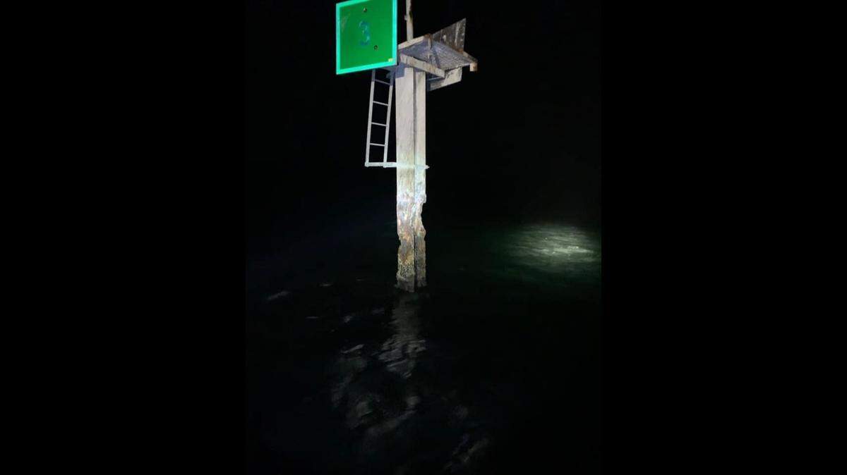 Garrison Bight Channel Light #3 structure is damaged after being hit by a 20-foot console boat driven by Kevin Scott Lancaster, with eight aboard, on May 10, 2019.