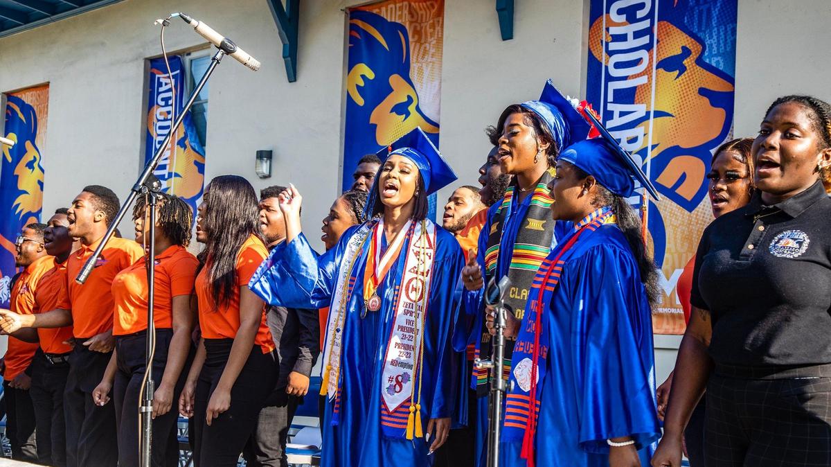 The nationally known chorus at Florida Memorial University, the Ambassador Chorale, performs during the spring commencement ceremony in Miami Gardens, on Saturday May 6, 2023.