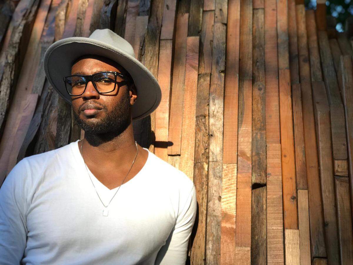Artist Brandon Clarke, who created ‘BLACK Card: Transactions of Cultural Currency,” an exhibit at the Historic Ward Rooming House in Overtown that runs through August.