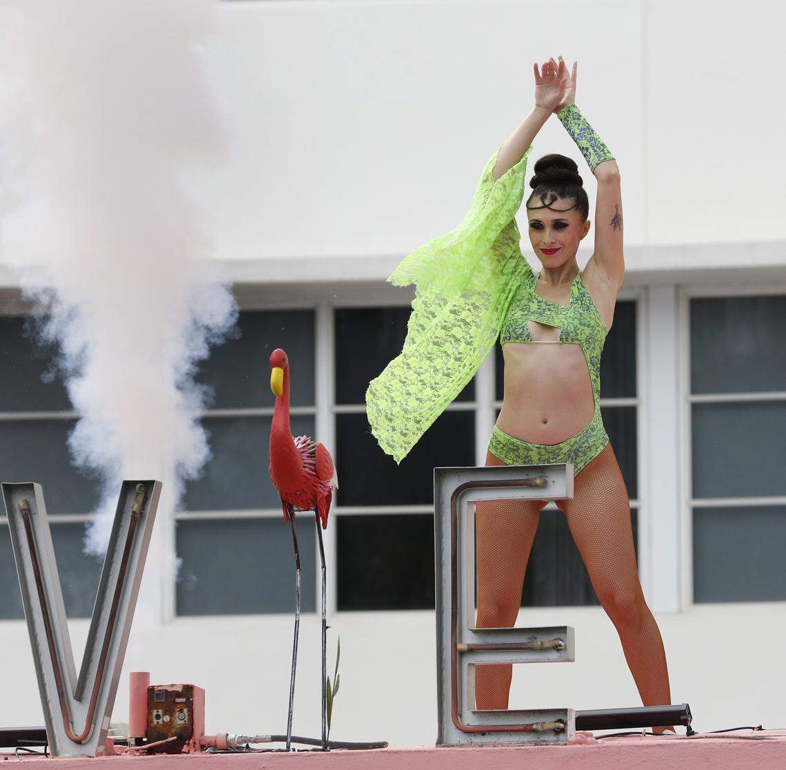 A dancer entertains people on Ocean Drive on Saturday, March 14, 2026 in Miami Beach. 