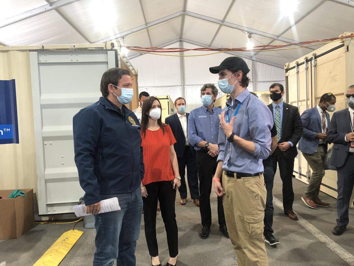 Gov. Ron DeSantis and Lt. Gov. Jeanette Nuñez tour a decontamination facility at Hard Rock Stadium in Miami Gardens on May 6, 2020. The facility can clean 80,000 N95 respirator masks per day, at no charge to healthcare personnel and long-term care facilities. The system uses hydrogen peroxide vapor to clean used masks, which can be cleaned and reused up to 20 times.