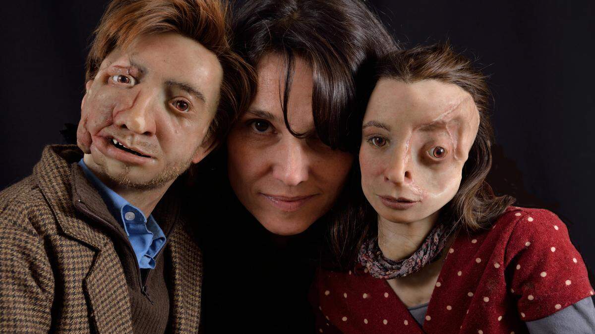 Chile’s Aline Kuppenheim with the two puppet protagonists from her most recent directorial work, ‘Feos.’