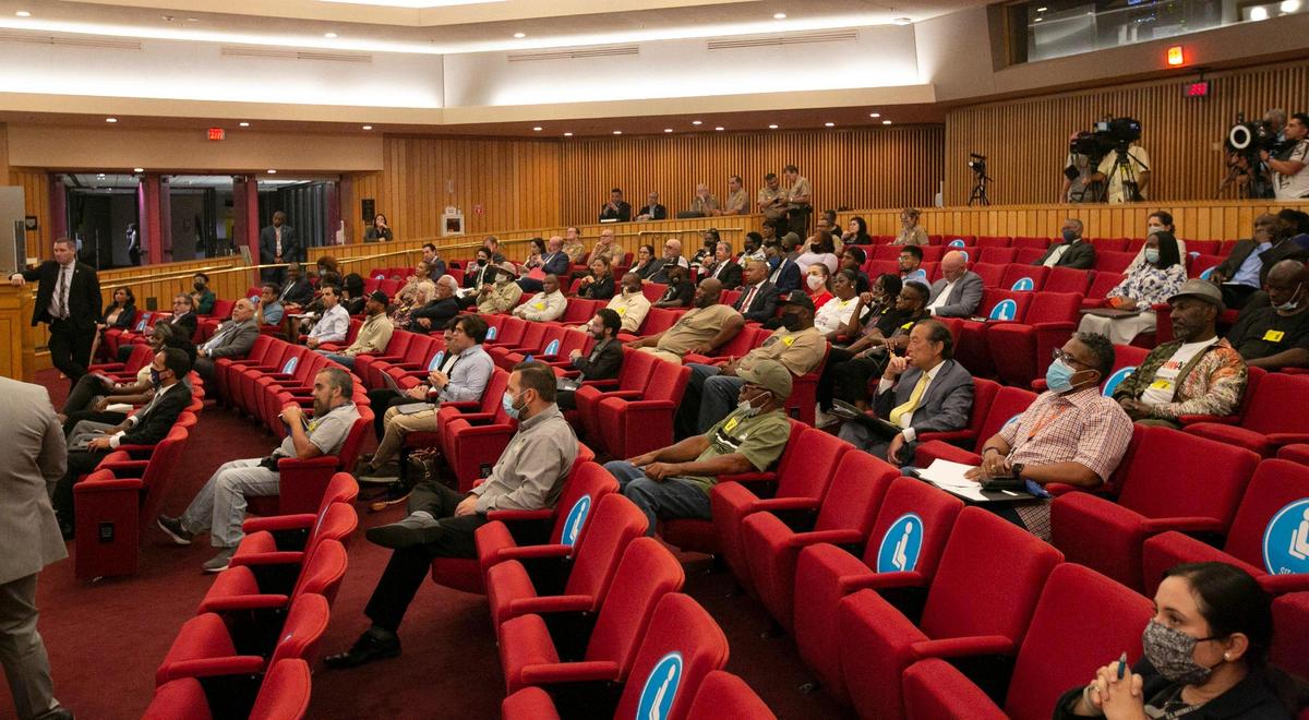 People attend a special county commission meeting held Tuesday afternoon, June 8, 2021, to address the recent gun violence in Miami-Dade County. During the meeting County Mayor Daniella Levine Cava won unanimous support for her nearly $8 million Peace and Prosperity Plan to boost summer jobs for teens.