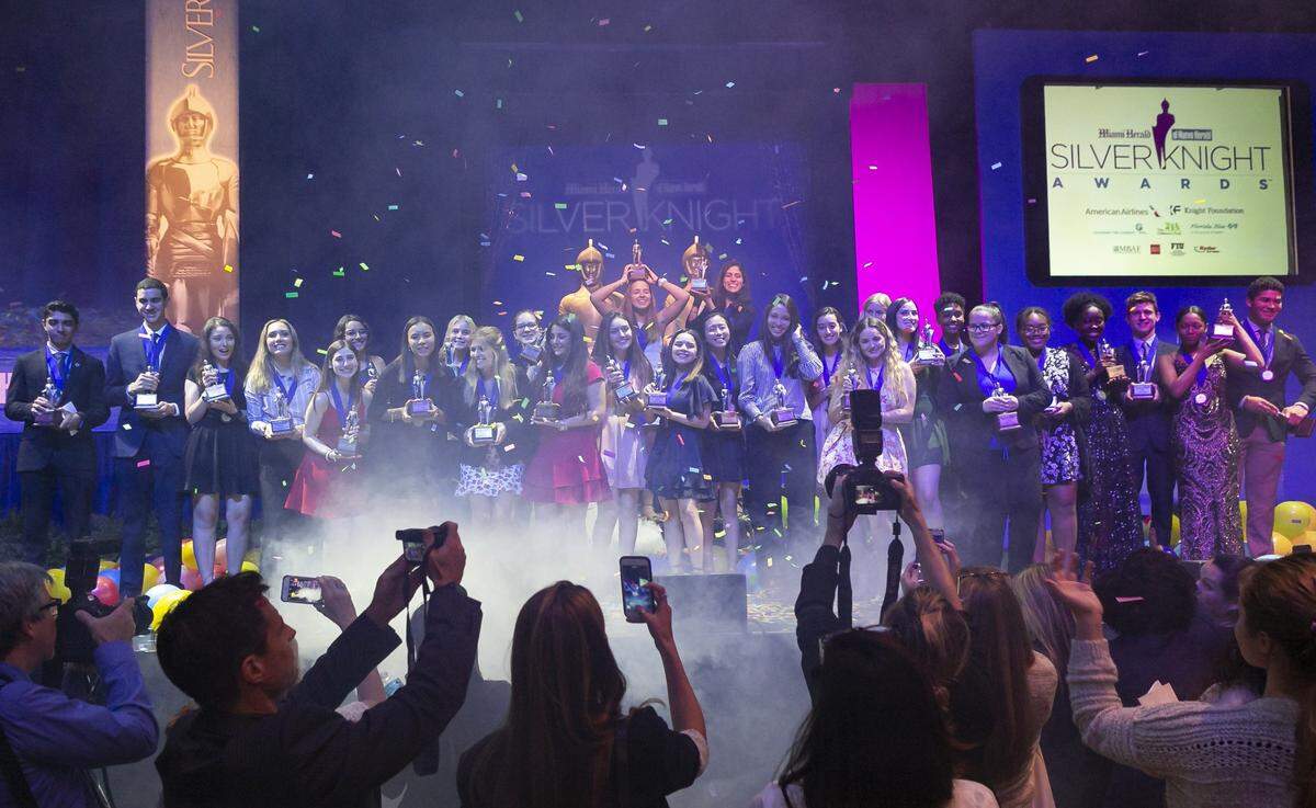 Silver Knight Award winners celebrate on stage after the Miami Herald and el Nuevo Herald’s 61st Silver Knight Awards at the James L. Knight Center on Thursday, May 16, 2019.