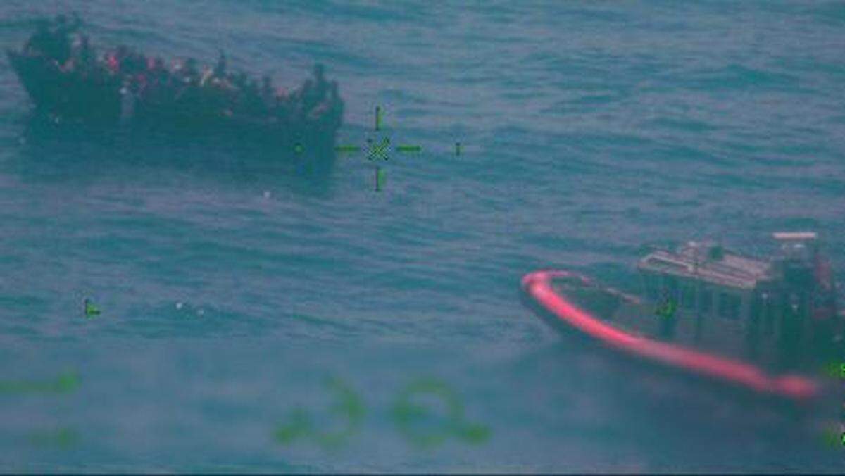 A civilian reported to Coast Guard Sector Key West watchstanders a rustic vessel about 22 miles south of Long Key, Florida, on May 28, 2022. The people were repatriated May 31, 2022.