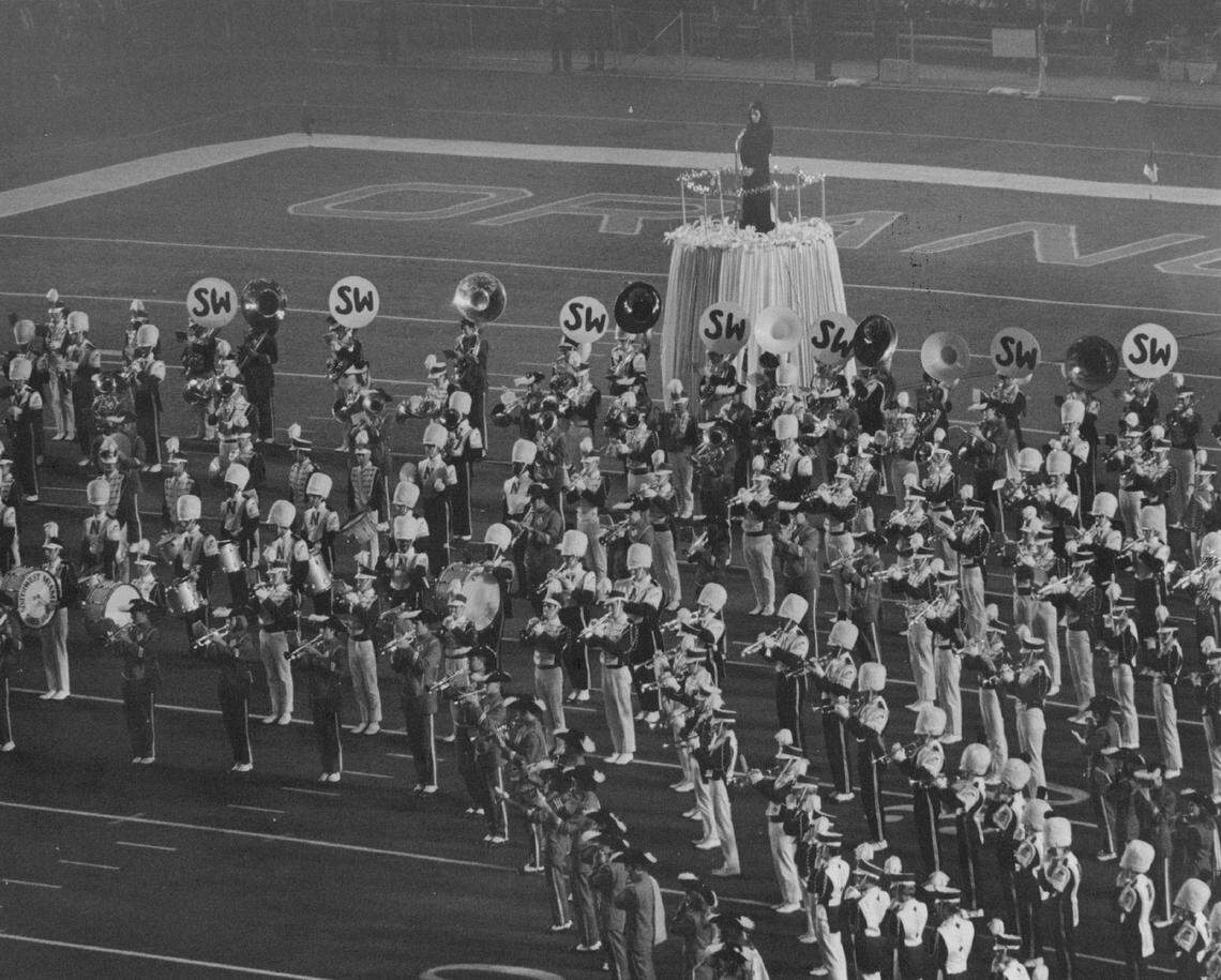 Anita Bryant sings the national anthem during the pre-game ceremonies of Miami’s 1971 Orange Bowl between Nebraska and LSU.