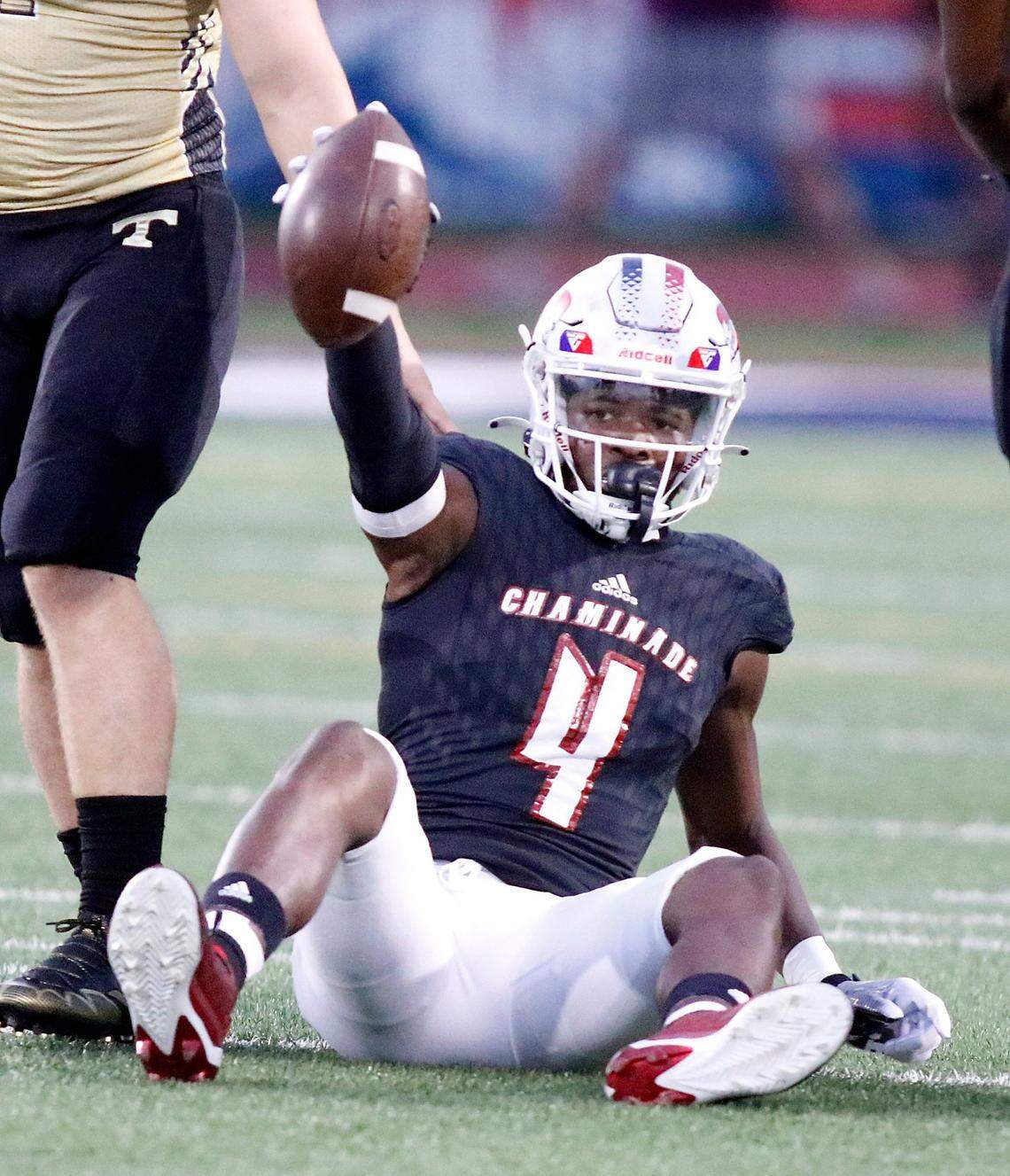 Chaminade-Madonna Lions wide receiver Jeremiah Smith (4) catches a pass during football game against Treasure Coast Titans on Thursday, November 3, 2022 at Chaminade-Madonna HS in Holliwood. Andrew Uloza / for Miami Herald