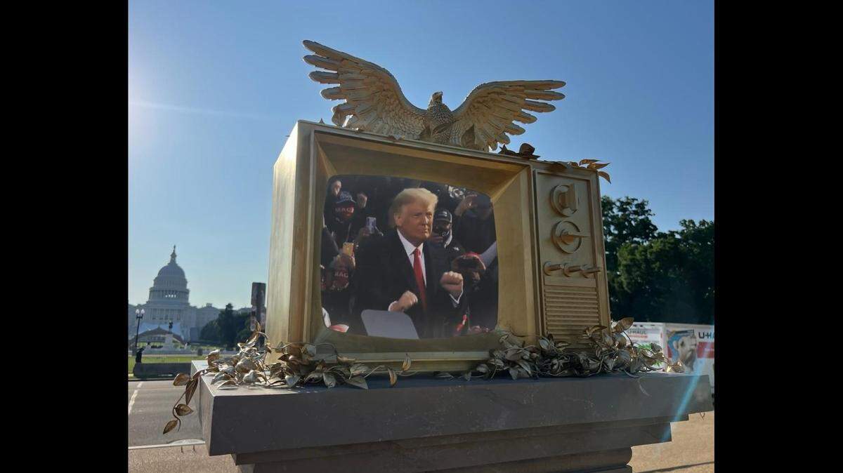 A new sculpture erected on the National Mall in Washington, D.C. shows a video art loop of President Donald Trump dancing.