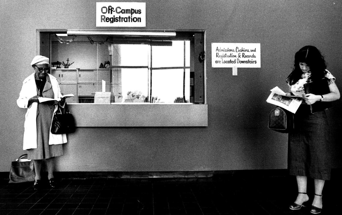 Mettie Brown, left, and Raisa Gonzalez stand by the off-campus registration window at the campus off Southwest Eighth Street in 1981. According to a Herald article, Brown was the school’s oldest student at 83.