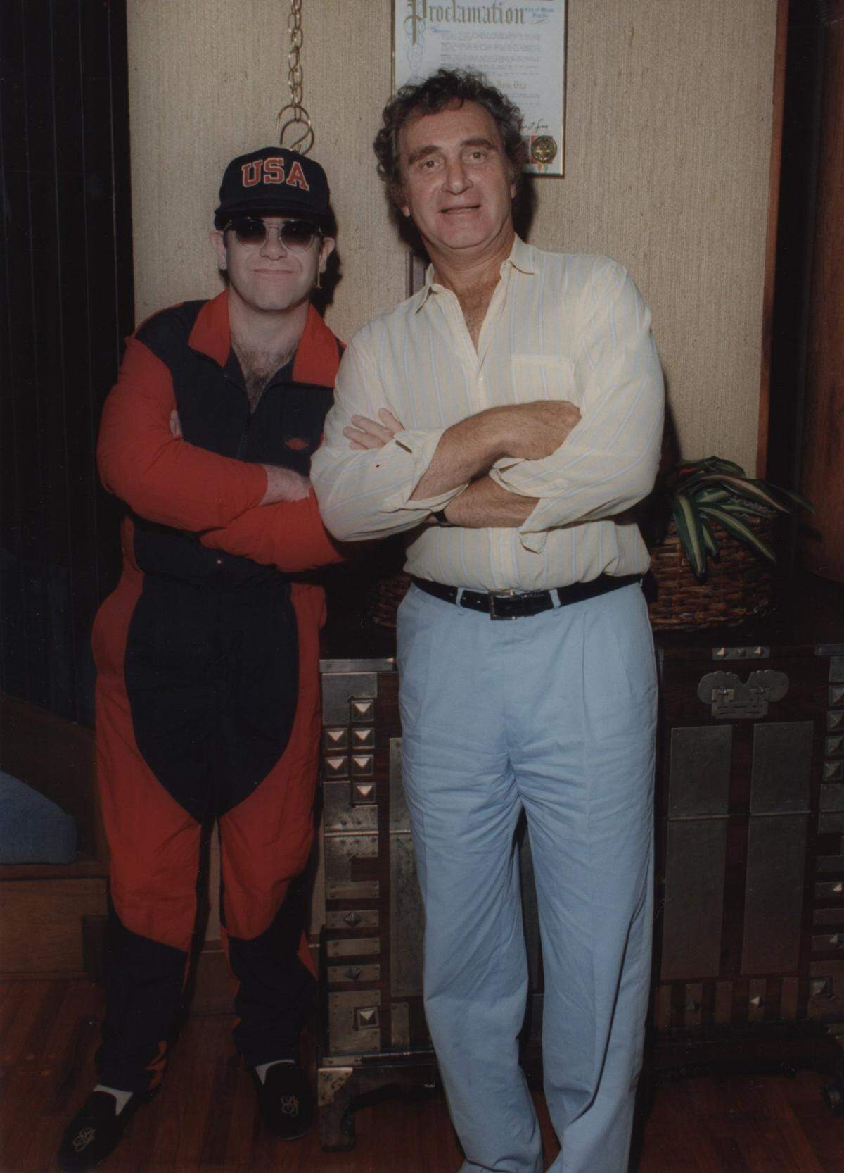 Elton John (left) with Don Soffer (right) lit the torch at Turnberry Isle for its first Whole Earth Run in this Nov. 1, 1986 file photo. Elton was a frequent patron of Turnberry Isle.