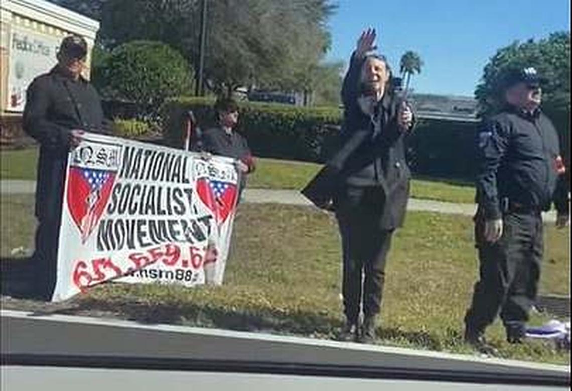 A small group wearing Nazi symbols gathered in the Orlando area, shouting anti-Semitic slurs and waving Nazi flags at passing motorists.