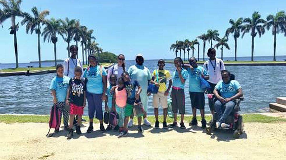 Campers attending Miami-Dade Parks’ summer camp for special needs children enjoy a field trip to the Deering Estate in Palmetto Beach.