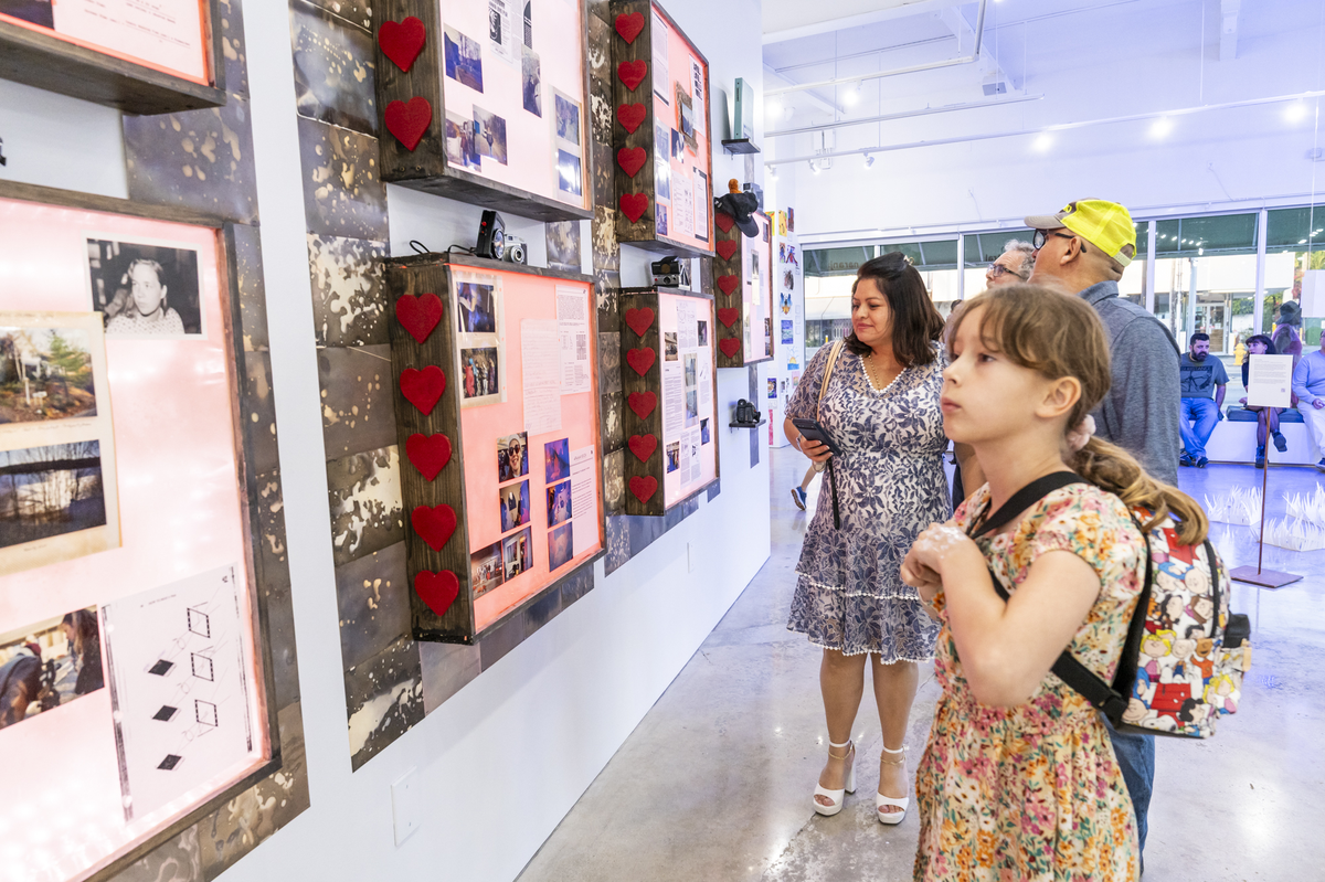 Local teaching artists with their students, friends and families celebrate the opening of ProjectArt’s exhibit at Green Space Miami.