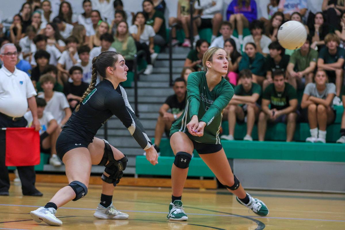 Westminster Christian Warriors outside hitter Gigi Artiles (7) digs the ball against the Palmer Trinity Falcons during the first set of a volleyball Region 4-3A quarterfinal playoff match at Westminster Christian School on Tuesday, October 24, 2023.