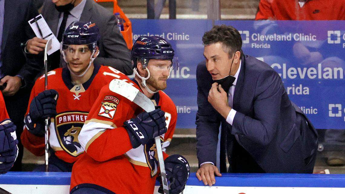 Florida Panthers interim head coach Andrew Brunette talks with Panthers left wing Jonathan Huberdeau during the first period of a game against the Los Angeles Kings at the FLA Live Arena on Thursday, Dec. 16, 2021, in Sunrise, Fla.