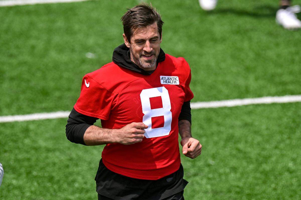 May 23, 2023; Florham Park, NJ, USA; New York Jets quarterback Aaron Rodgers (8) warms up during OTA’s at Atlantic Health Jets Training Center. Mandatory Credit: Jonathan Jones-USA TODAY Sports