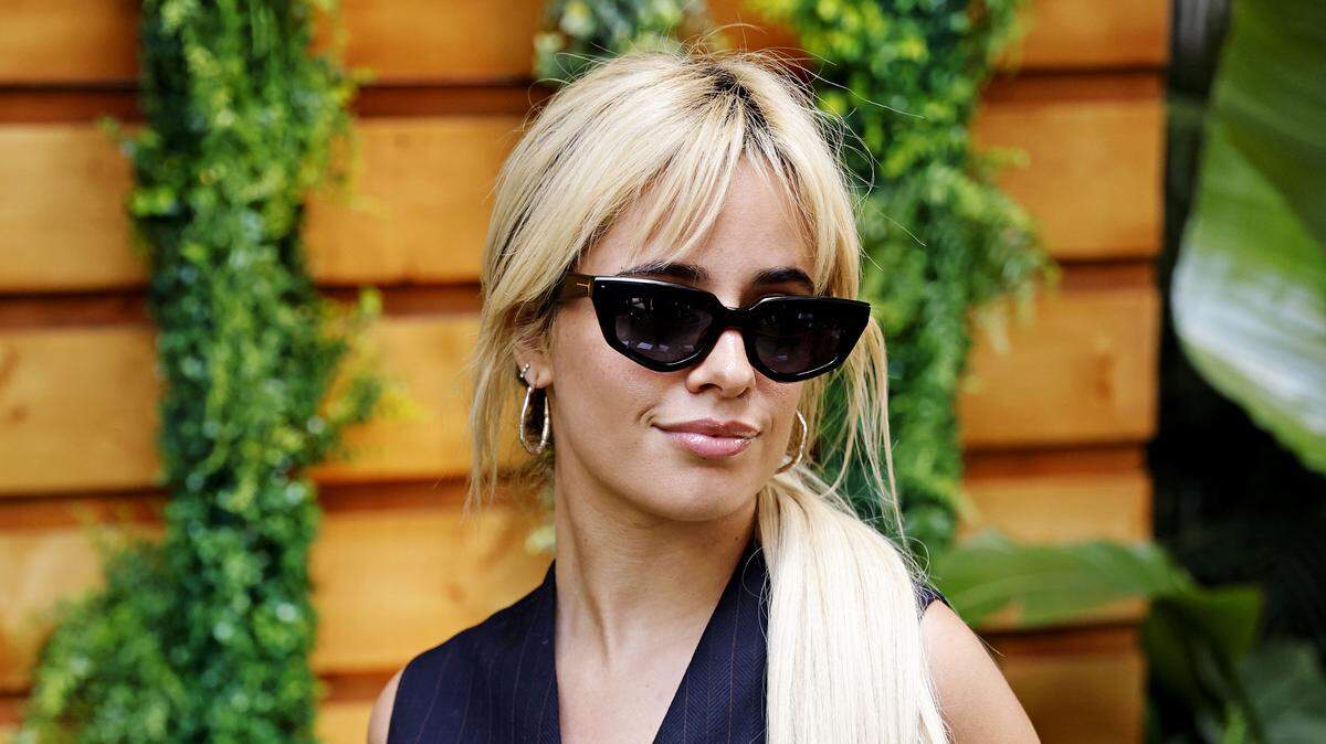 May 5, 2024; Miami Gardens, Florida, USA; Recording artist Camila Cabello poses before the Miami Grand Prix at Miami International Autodrome. Mandatory Credit: Peter Casey-USA TODAY Sports