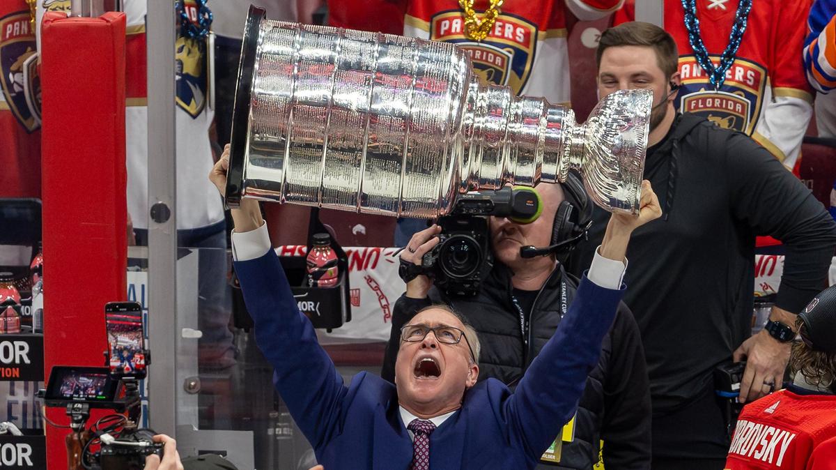 Florida Panthers head coach Paul Maurice (1) lifts the Stanley Cup after the Panthers defeated the Edmonton Oilers in Game 7 of the NHL Stanley Cup Final at the Amerant Bank Arena on Monday, June 24, 2024, in Sunrise, Fla.