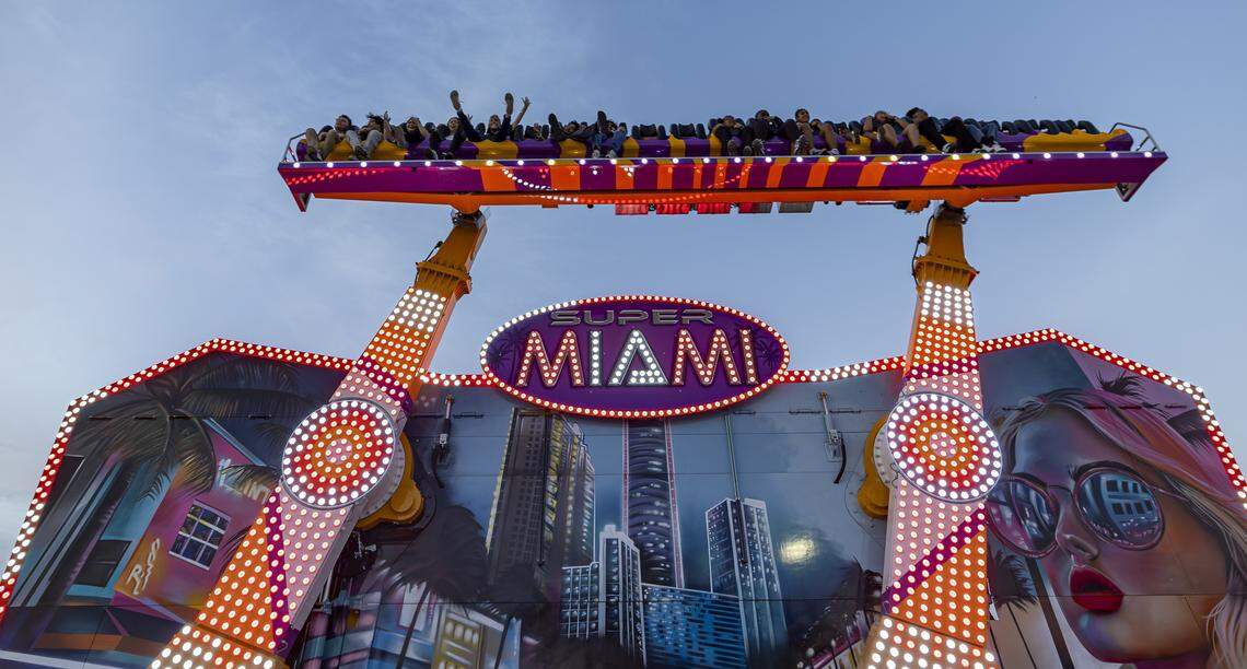 Guests ride the Super Miami attraction during the opening day of the 74th annual Miami-Dade County Youth Fair on Thursday, March 12, 2026, in Miami, Fla.