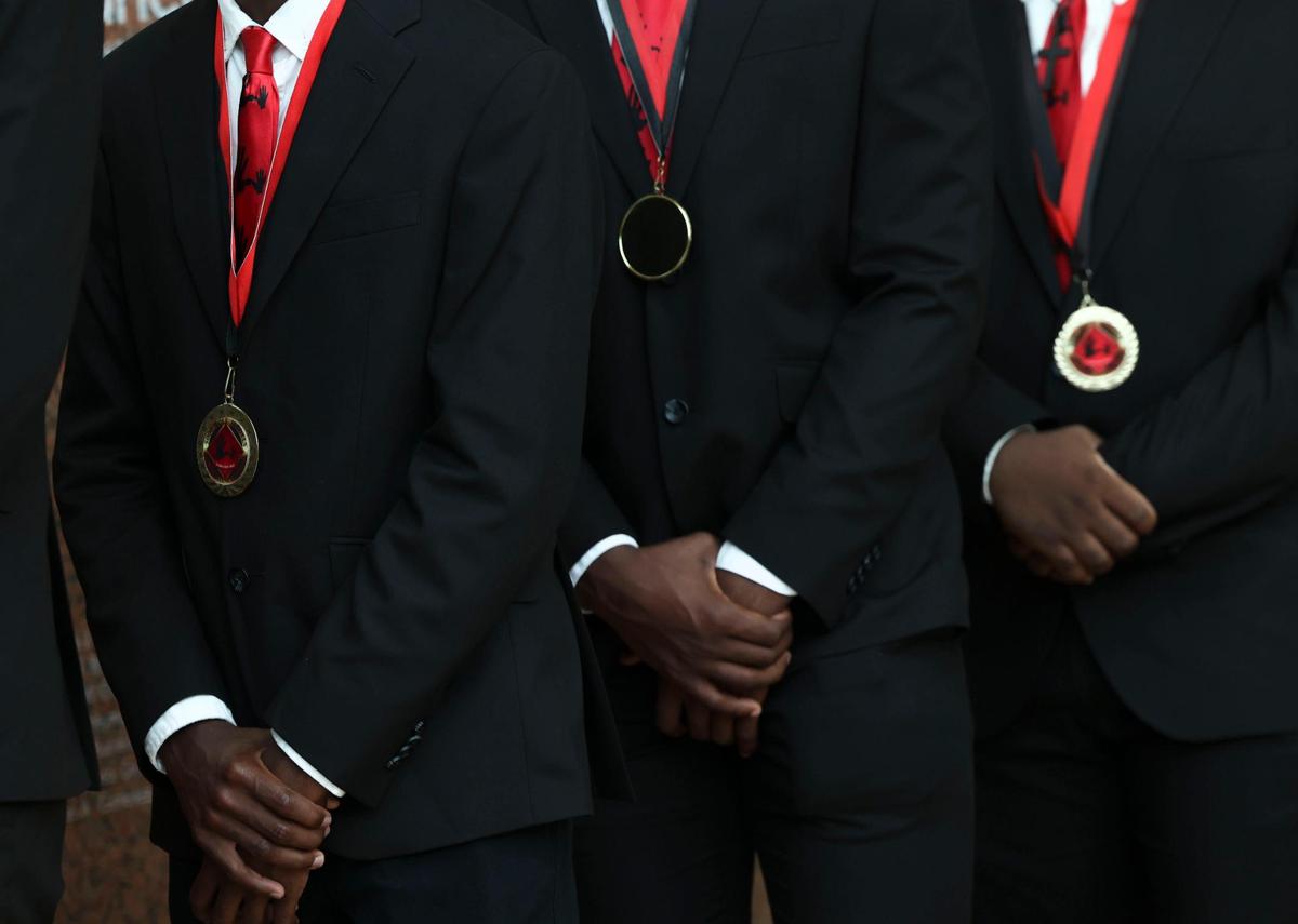 Medals hang on the Wilson Scholars before their scholarship ceremony for the 5000 Role Models of Excellence Program on Sunday, June 5, 2022, at the Adrienne Arsht Center in downtown Miami. The program pairs young men with mentors and, at the end of the program, the young men receive full tuition scholarships to the university of their choosing. Some of the mentors were mentees in the past.