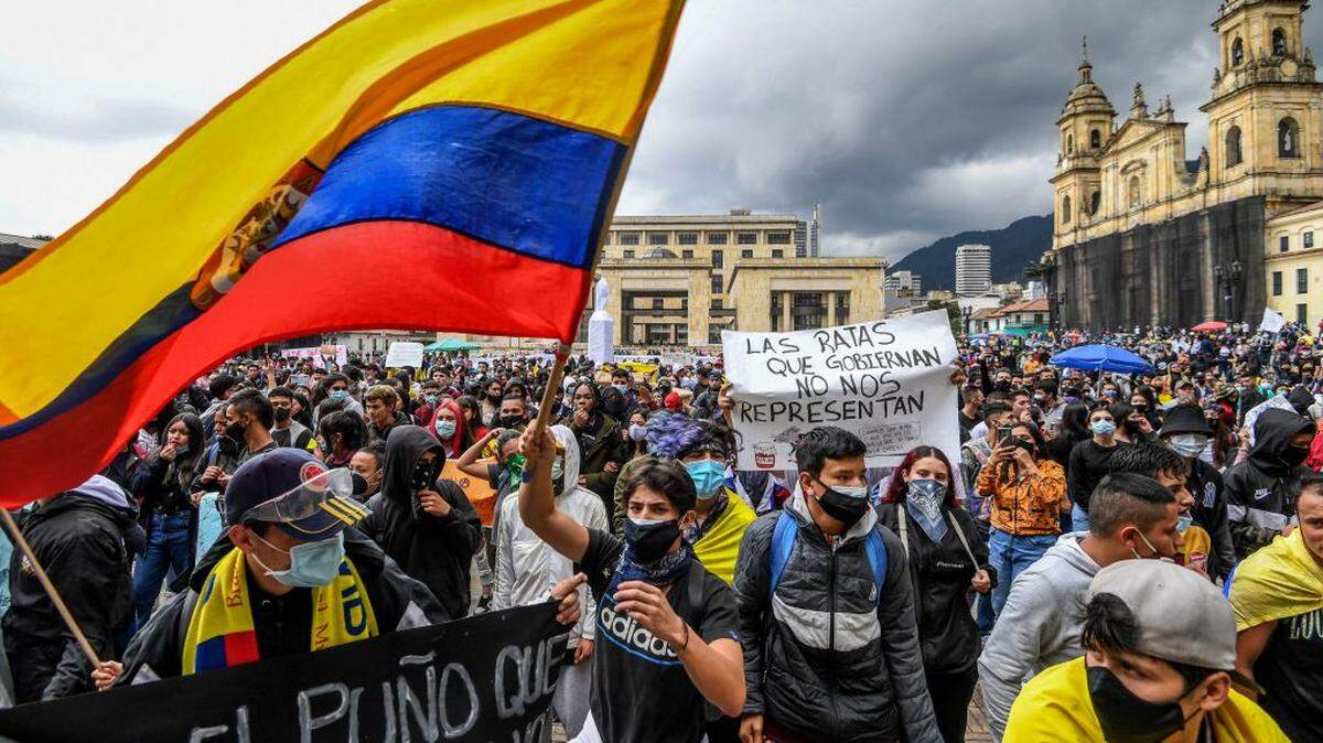 Demonstrators in Bogota, Colombia, protest against President Iván Duque’s tax reform bill.