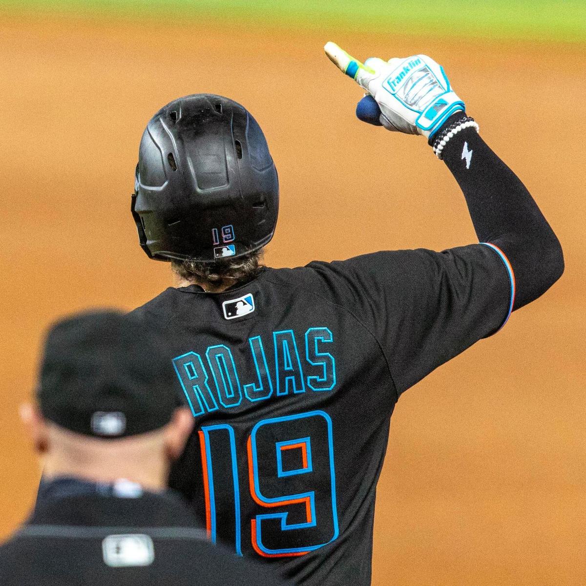 Miami Marlins shortstop Miguel RojasÂ&nbsp;(19) reacts after hitting a line drive to center field during the first inning of an MLB game against the Milwaukee Brewers at loanDepot park in the Little Havana neighborhood of Miami, Florida, on Friday, May 7, 2021.