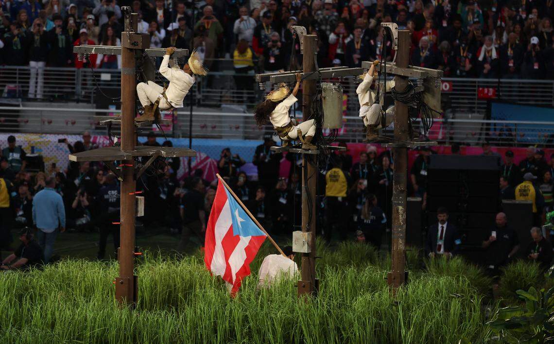 Puerto Rican singer Bad Bunny waves the flag of Puerto Rico as he performs during Super Bowl LX Patriots vs Seahawks Apple Music Halftime Show at Levi's Stadium in Santa Clara, California on February 8, 2026.
