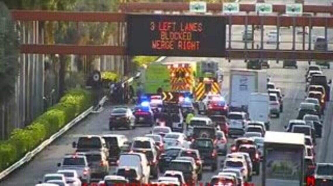 A Miami-Dade rollover crash backed up traffic on three major roads all morning