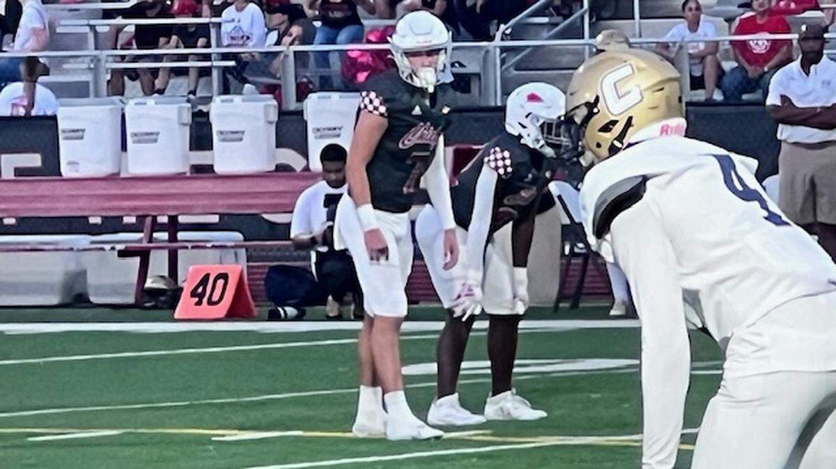 Cardinal Gibbons quarterback Jayden Torres (No. 7, center) passed for 374 yard and three touchdowns as the Chiefs rallied to defeat Calvary Christian 36-35 on Friday night at Gibbons in Fort Lauderdale, Fla.