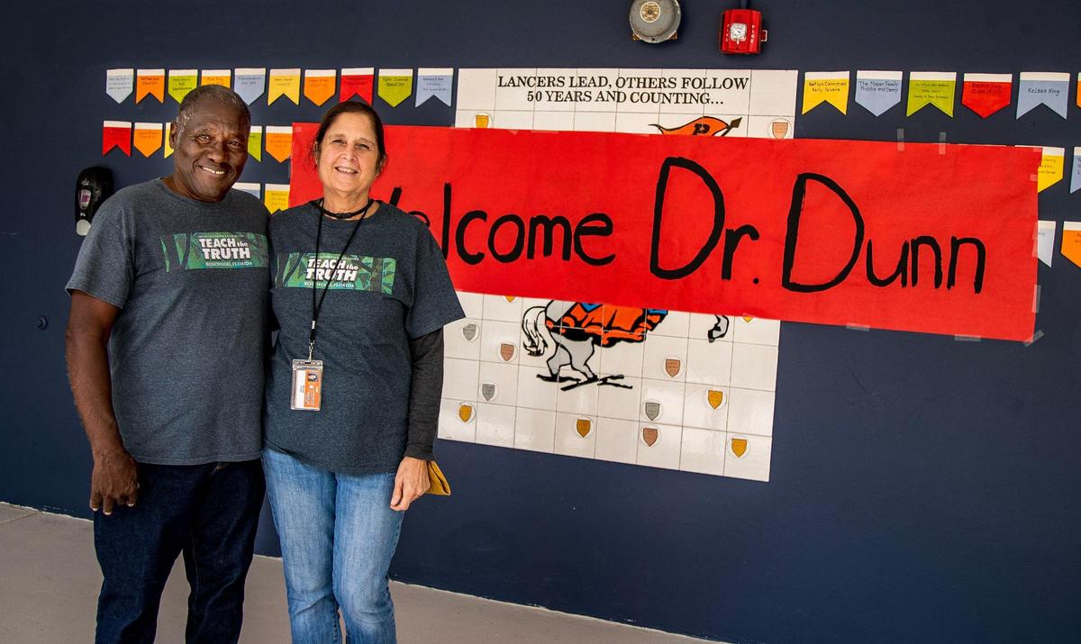 Teacher Mayade Ersoff and Marvin Dunn pose together after Dunn’s presentation on The Civil Rights Movement in Florida to U.S. history students and seventh-grade civics students at the Palmetto Middle School, in Pinecrest, on Thursday February 01, 2024.