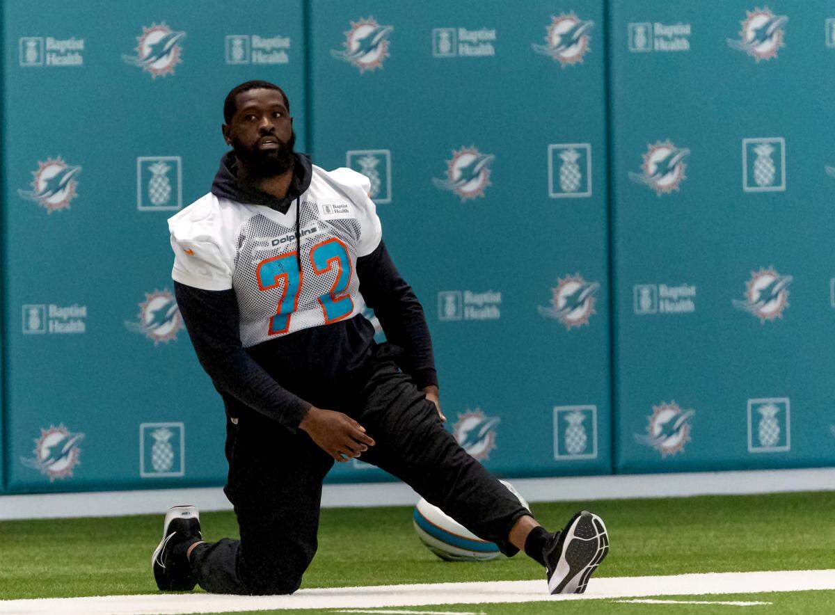 Miami Dolphins offensive tackle Terron Armstead (72) stretches during NFL mandatory minicamp at Baptist Health Training Complex in Hard Rock Stadium on Tuesday, June 4, 2024, in Miami Gardens, Fla.