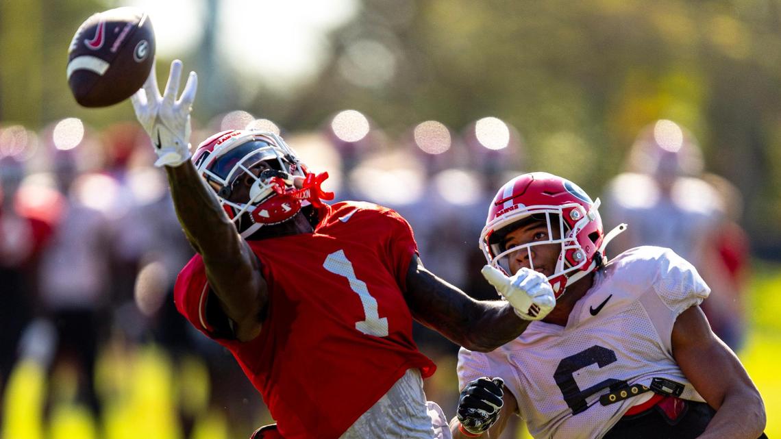 University of Georgia wide receiver Marcus Rosemy-Jacksaint (1) attempts to catch the ball while defended by defensive back Daylen Everette (6) during Orange Bowl practice at Barry University in Miami Shores, Florida, on Wednesday, December 27, 2023.