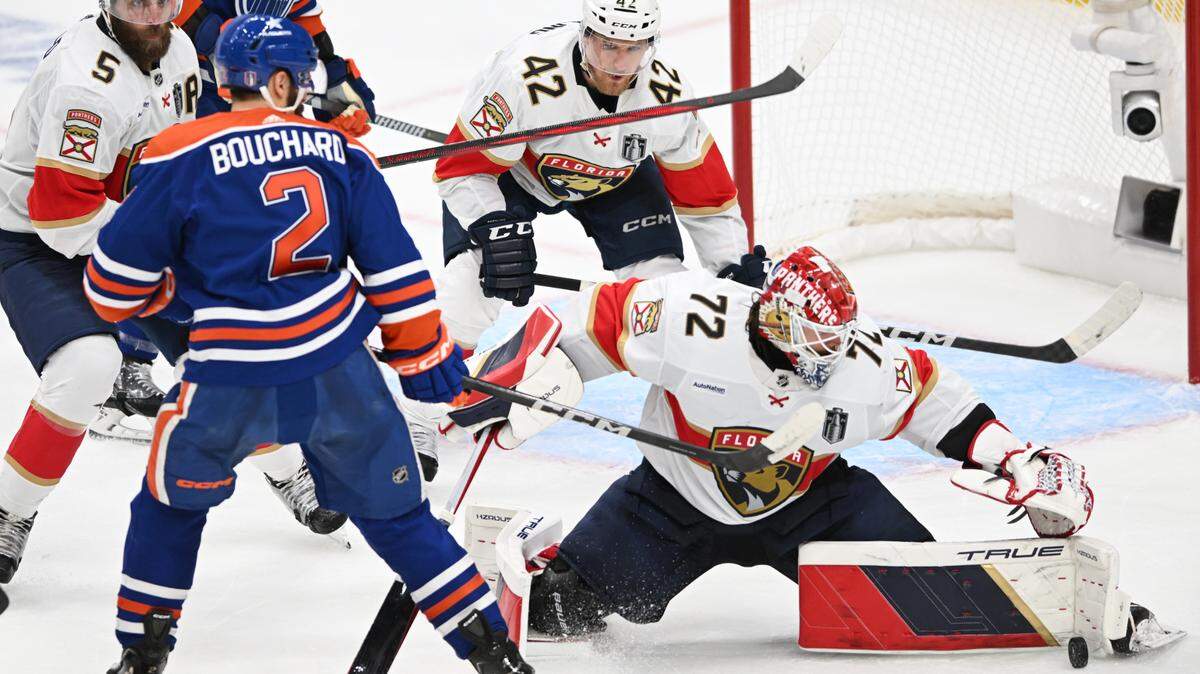 Jun 13, 2024; Edmonton, Alberta, CAN; Florida Panthers goaltender Sergei Bobrovsky (72) makes a save on Edmonton Oilers defenseman Evan Bouchard (2) in the second period in game three of the 2024 Stanley Cup Final at Rogers Place. Mandatory Credit: Walter Tychnowicz-USA TODAY Sports