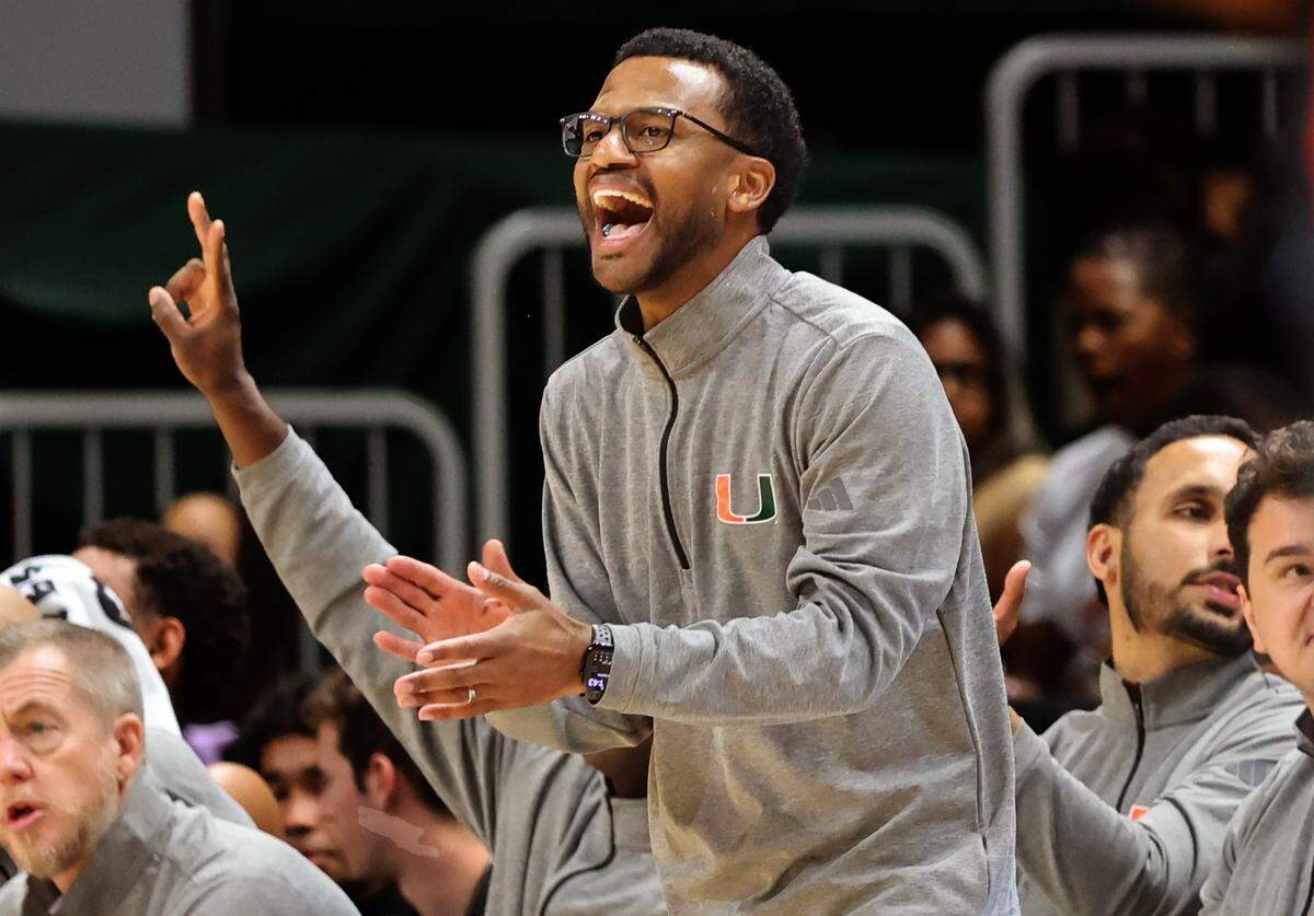 UM head coach Jai Lucas instructs on the sidelines as Miami Hurricanes (4-1) played against Delaware State Hornets in the first half at the Watsco Center in Coral Gables, on Sunday, November 23, 2025.