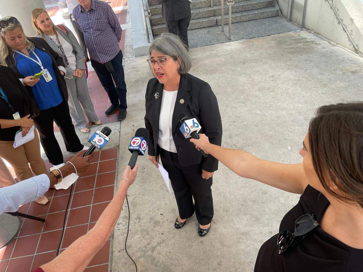 Miami-Dade Mayor Daniella Levine Cava speaks to reporters Tuesday, May 16, 2023, outside of the Government Center transit station to discuss delayed elevator and escalator repairs at some Metromover platforms.