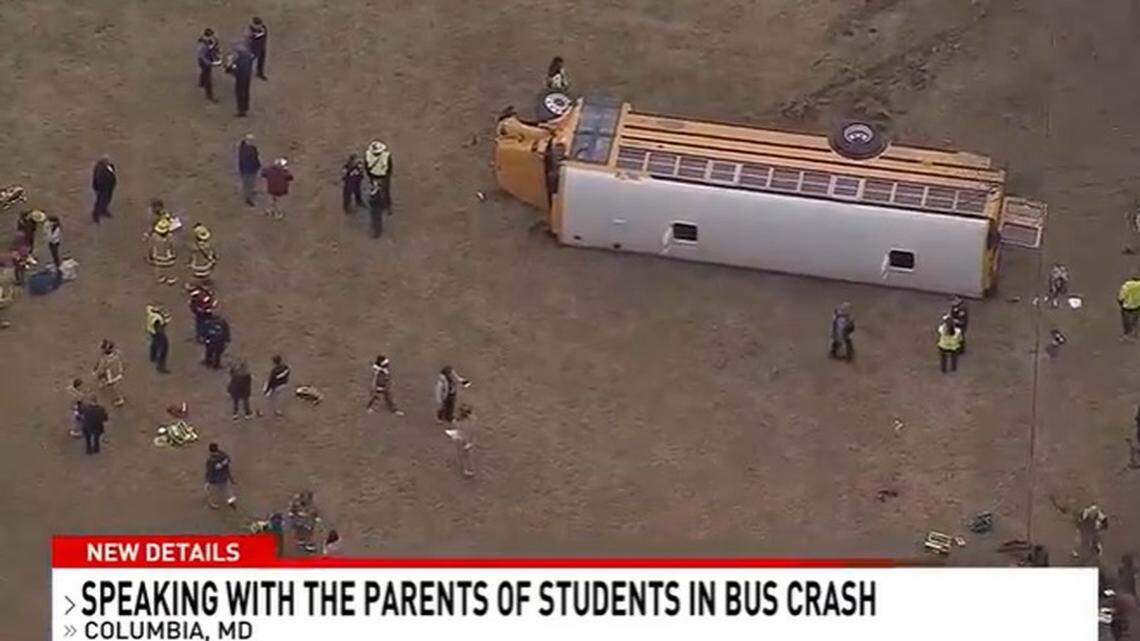 Four middle school students were injured when their school bus ran off the road and landed on its side in Howard County, Maryland.