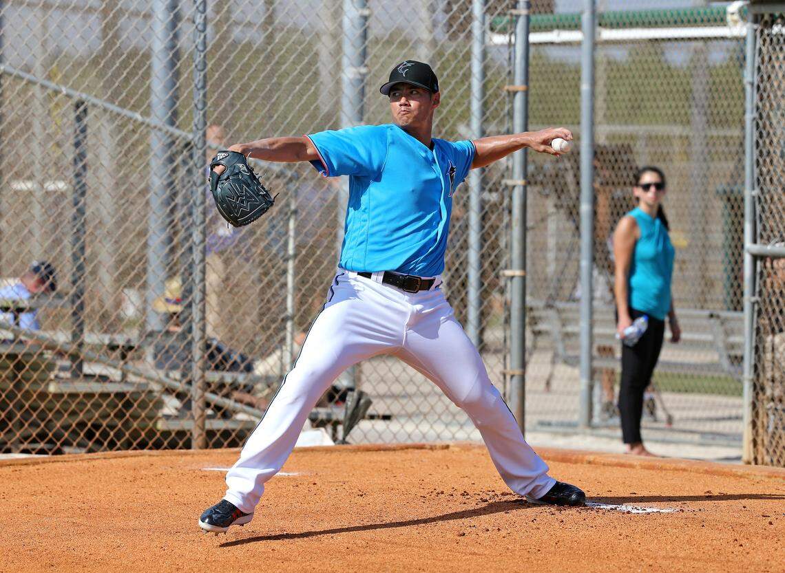 Miami Marlins pitcher Wei-Yin Chen (20) pitches during the first full-squad spring training workout on Monday, February 18, 2019 in Jupiter, FL.