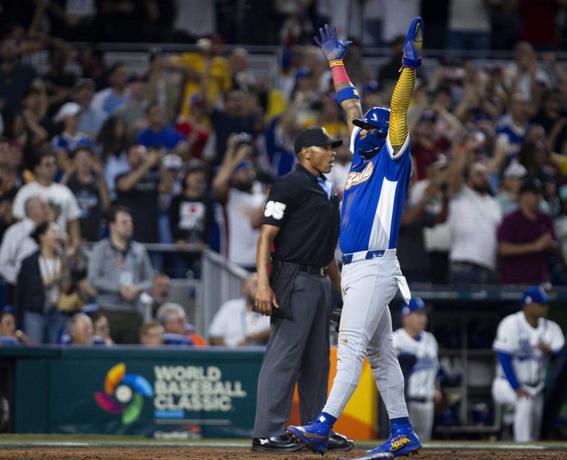 Venezuela outfielder Ronald Acuña Jr. (21) reacts as he walks across home plate during the seventh inning of the World Baseball Classic semifinal against Italy on Monday, March 16, 2026, at loanDepot Park in Miami, Fla.