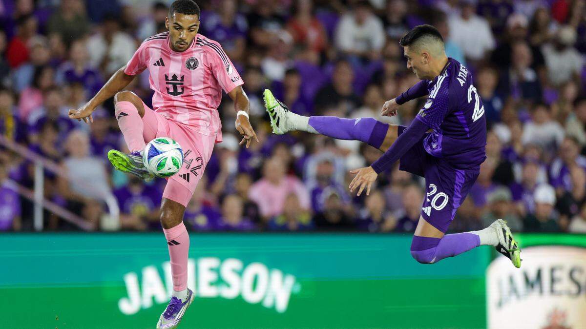 Aug 10, 2025; Orlando, Florida, USA; Inter Miami midfielder Yannick Bright (42) controls the ball from Orlando City midfielder Eduard Atuesta (20) in the second half at Inter&Co Stadium. Mandatory Credit: Nathan Ray Seebeck-Imagn Images