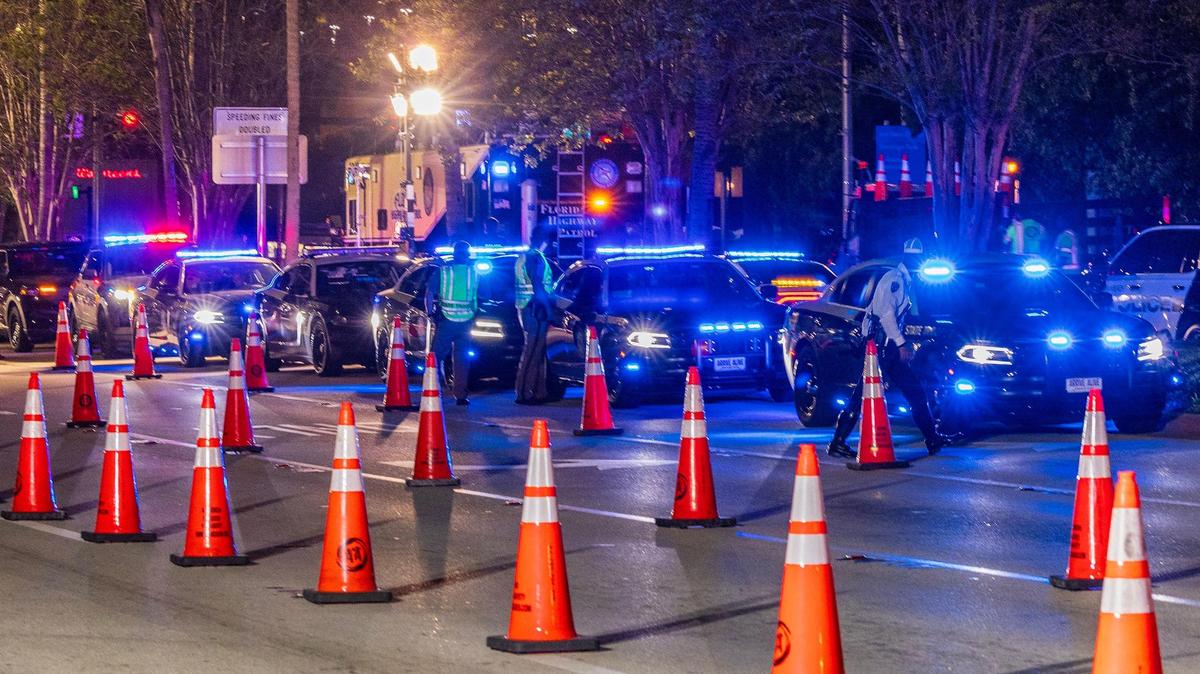 Police operate a DUI checkpoint on Fifth Street during spring break in Miami Beach on Friday, March 21, 2025.