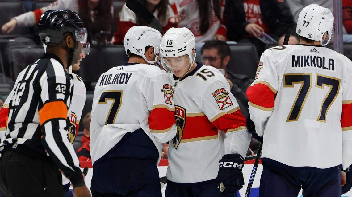 Nov 2, 2023; Detroit, Michigan, USA; Florida Panthers center Anton Lundell (15) is congratulated by teammates after scoring in the third period against the Detroit Red Wings at Little Caesars Arena. Mandatory Credit: Rick Osentoski-USA TODAY Sports