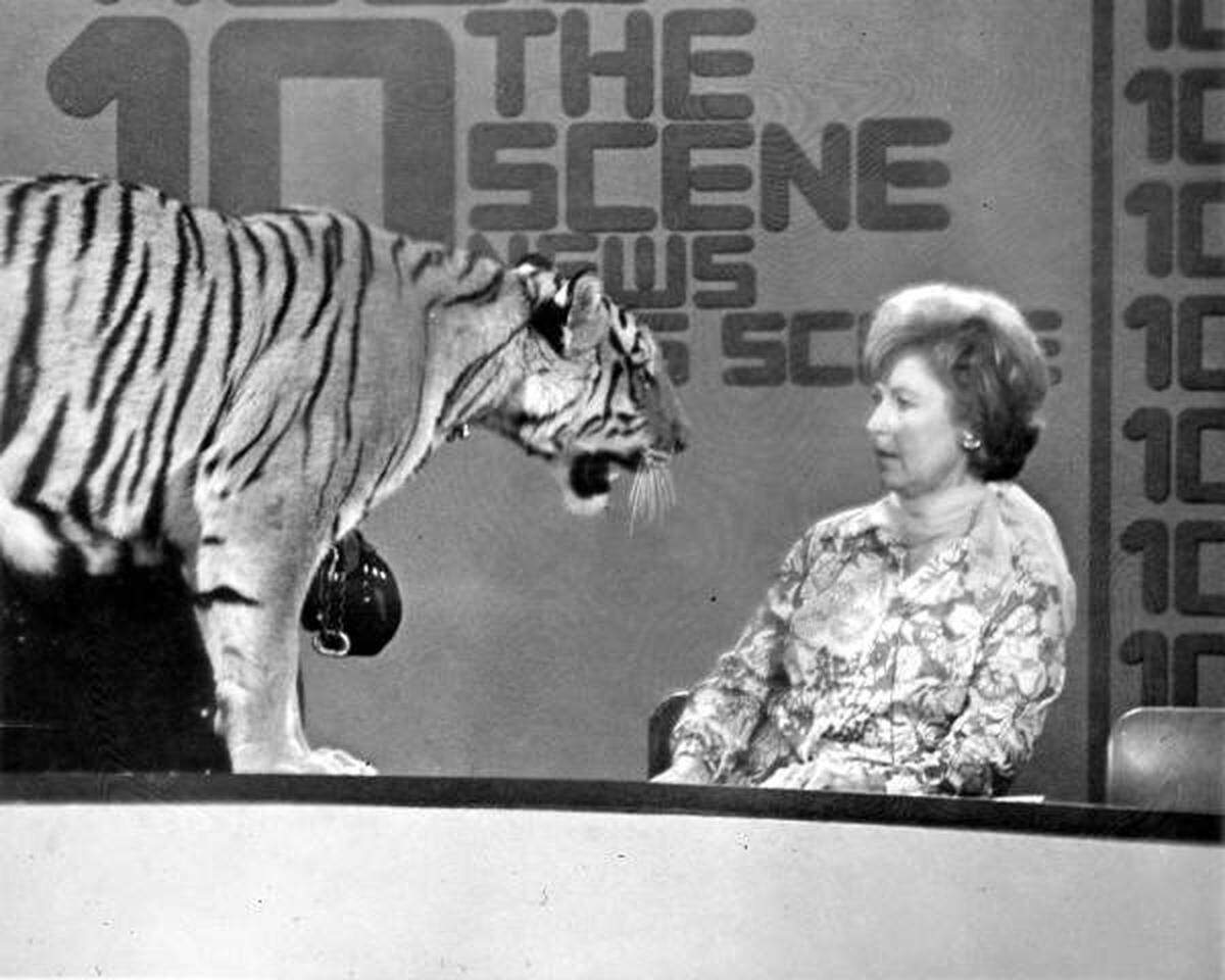 Molly Turner wiith a tiger on the Channel 10 set.