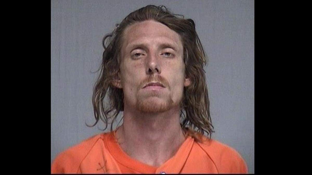 Nassau County Sheriff’s Office says Richard Guinn, 33, sent rambling emails that threatened black police officers and anybody who lives on military bases to Iberia Bank’s CEO.
