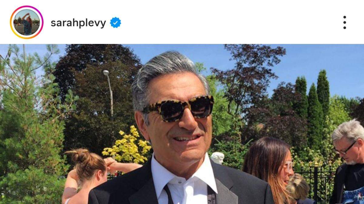 eugene levy wearing black and white tuxedo