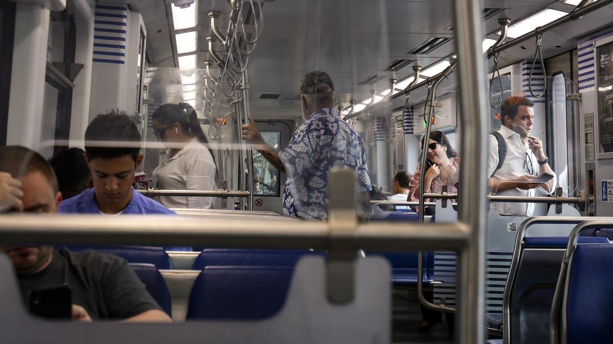 Commuters ride the Metrorail on Wednesday, July 24, 2024.