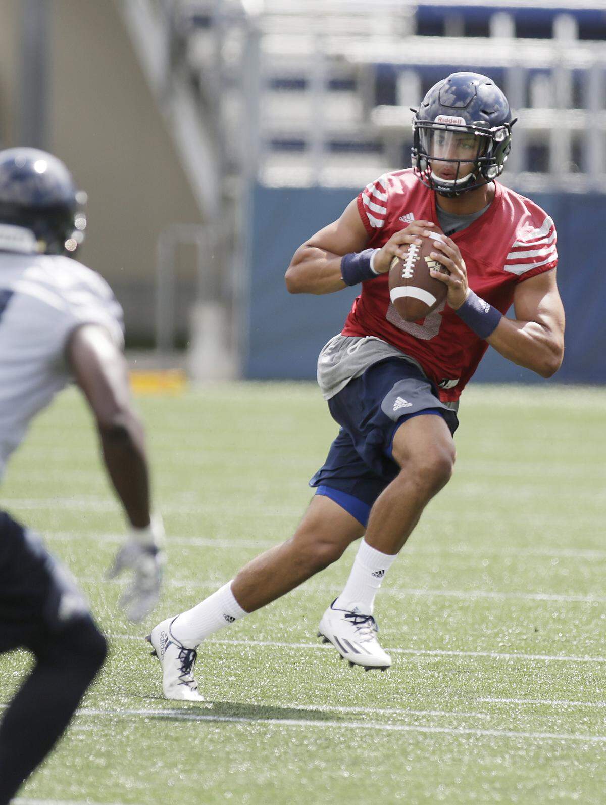 FIU Panther quarterback Christian Alexander runs the ball during first fall football practice on Saturday, July 20, 2017 at Riccardo Silva Stadium in Miami